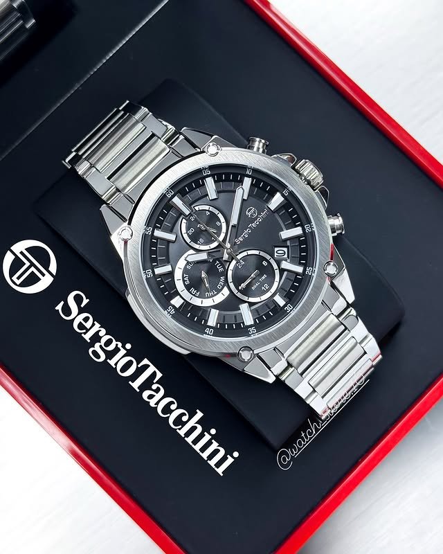 Sergio Tacchini premium mens watch with a dark multi-function dial and silver metal strap in Malappuram.