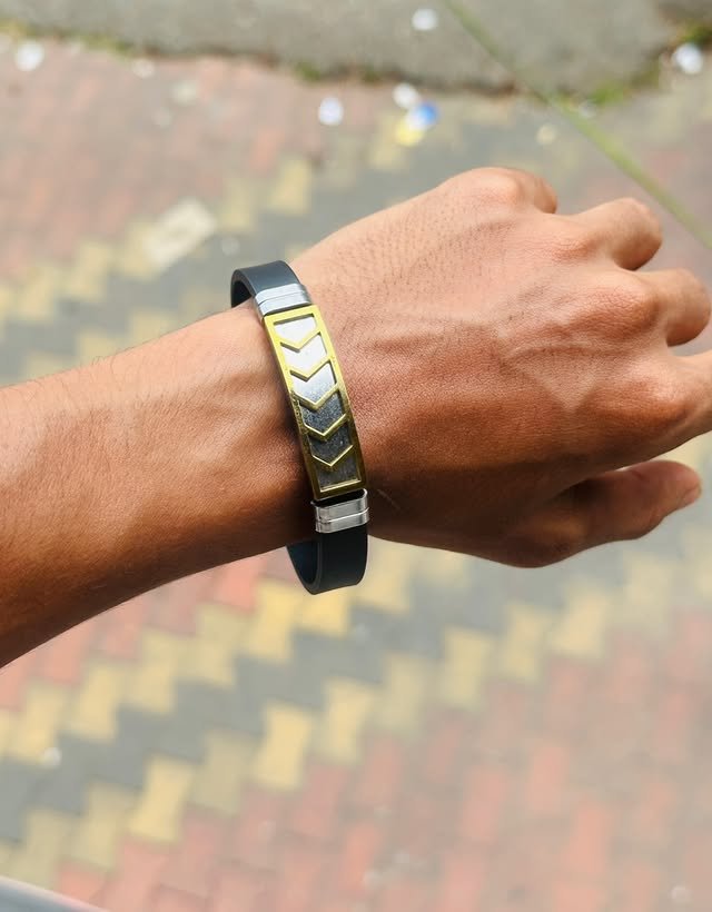 Black and gold men’s bracelet worn on wrist – Best Mens Accessories Shop In Malappuram